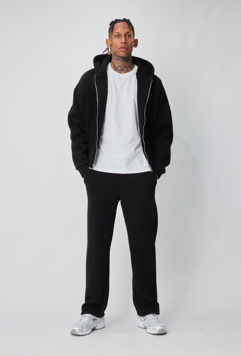 Ensemble basique jogging de couleur noir pantalon coupe droite et veste