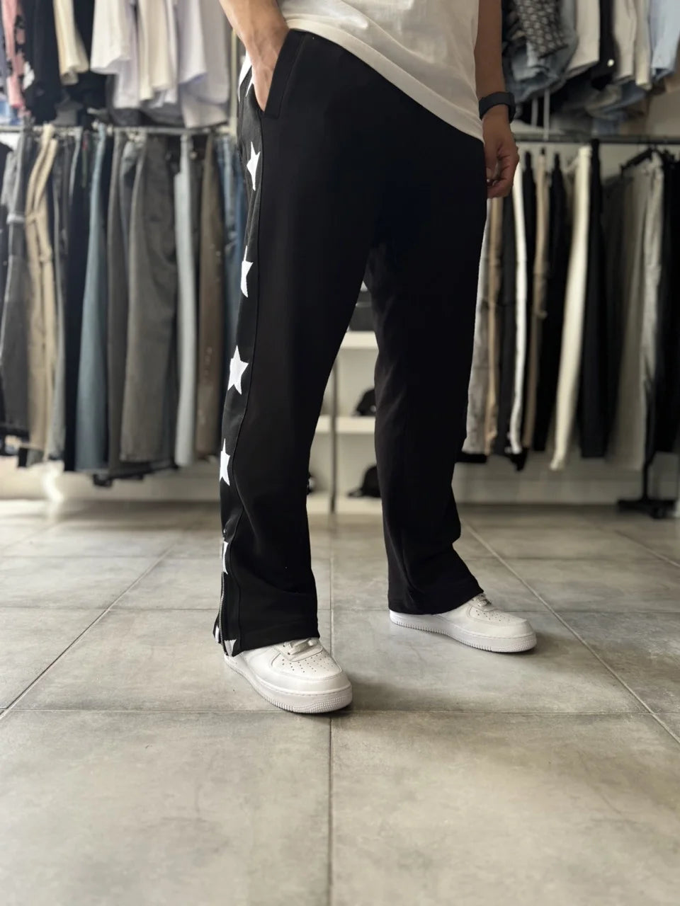 Pantalon jogging noir imprimé étoiles avec fermeture éclair