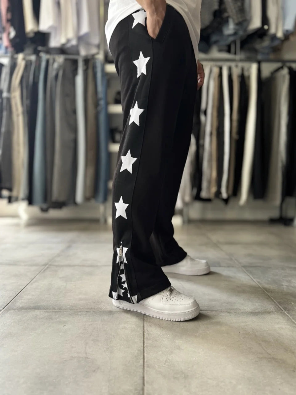 Pantalon jogging noir imprimé étoiles avec fermeture éclair