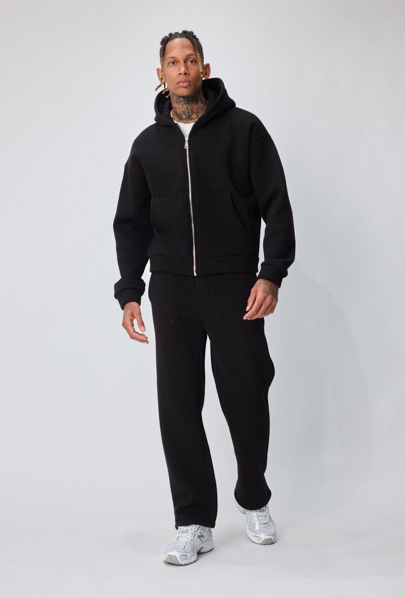 Ensemble basique jogging de couleur noir pantalon coupe droite et veste