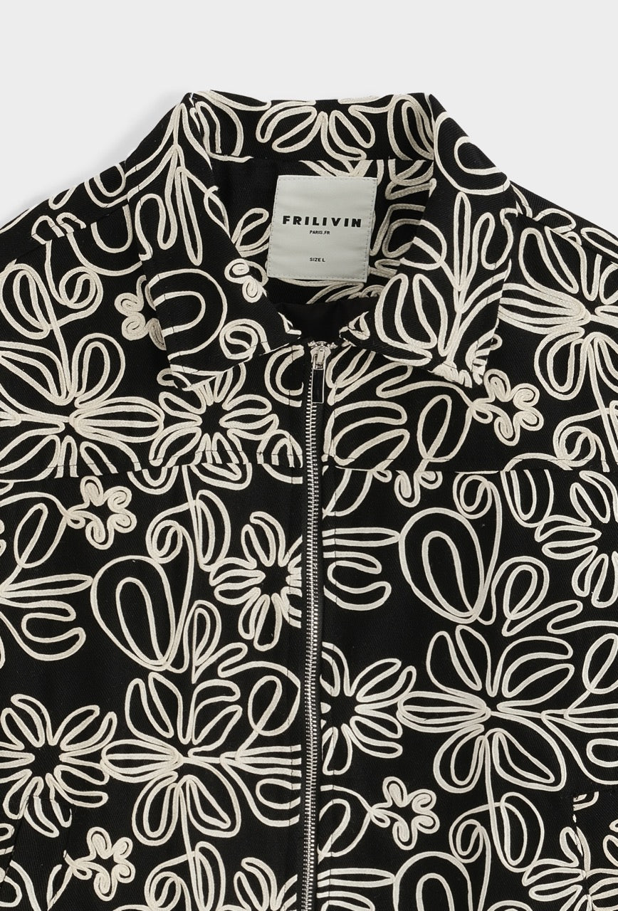 Veste noire zippée à broderies fleurs blanches | Lyon